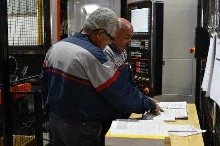 Two People Planning Laser Cutting
