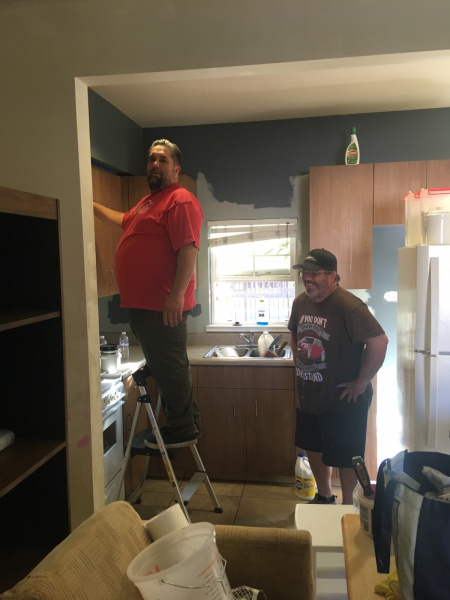 Marcelo and Dan spruce up the kitchen.
